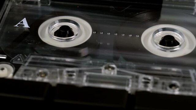 Audio cassette playing, vintage cassette tape player.