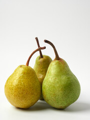 Green pear with a leaf isolated on white. Pear Clipping Path. Professional studio photo