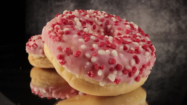 Strawberry sugar doughnuts in close-up view - macro shot - food photography