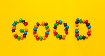 the word "good" from chacolad colored candies