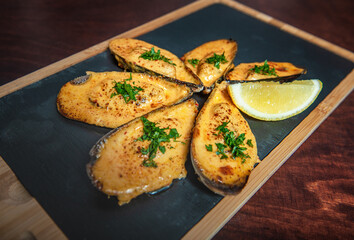 Delicious Shellfish mussels with herbs and lemon