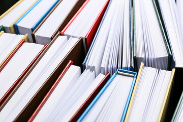 Many different books as background