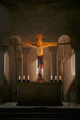 The altar and the crucifix of Sant'Antimo Abbey, Tuscany, Italy