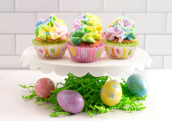 Pastel Rainbow Frosted Easter Cupcakes  on a Kitchen Counter