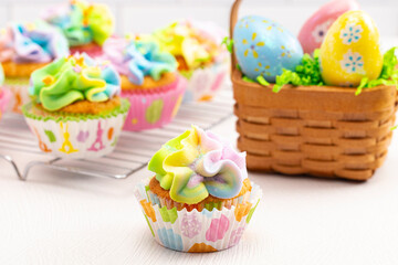 Pastel Rainbow Frosted Easter Cupcakes  on a Kitchen Counter