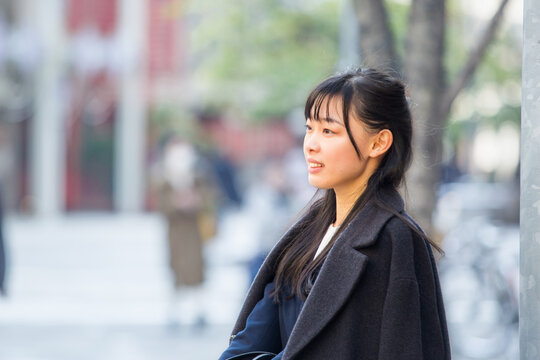 Young Business Woman Waiting For Someone On The Street