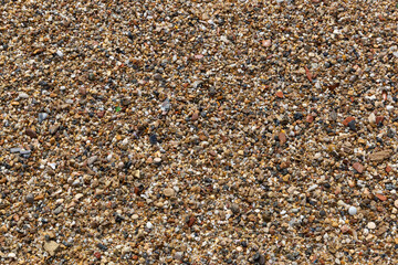 Sea pebble and stones on a beach. Natural background.