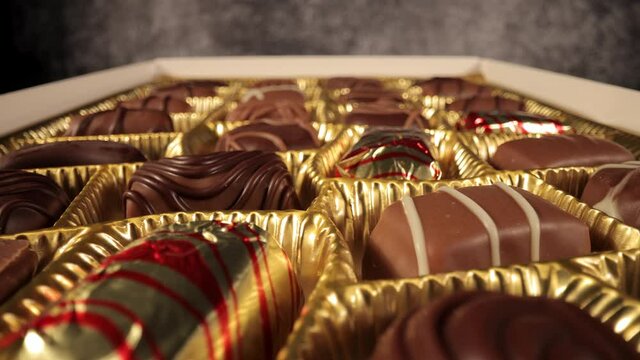 A box of chocolates pralines in close-up view - food photography