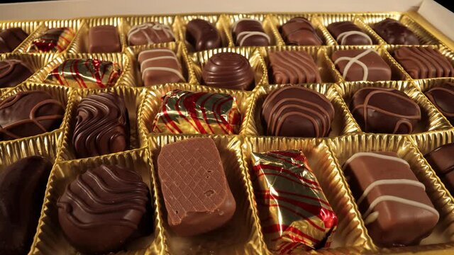 A box of chocolates pralines in close-up view - food photography