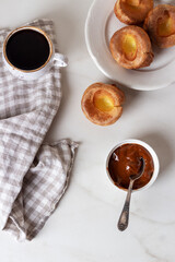 Yorkshire Puddings with condensed milk cream and coffe. Homemade Traditional fluffy golden Yorkshire Puddings.
