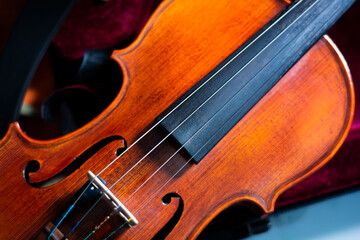 close up of a violin with dark background for copy space © itsuky