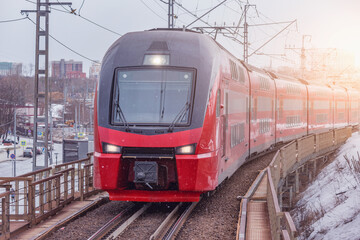 Fototapeta premium Highspeed train approaches to the station platform.