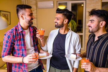 indian friends at the restaurant at Birthday home party