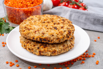 Healthy vegetarian or vegan food, meat free burger made from orange lentils legumes