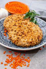 Healthy vegetarian or vegan food, meat free burger made from orange lentils legumes