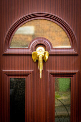 Elephant head door knocker with long trunk