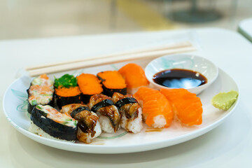 A plate of fresh sushi at the food court in the mall