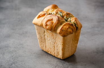 Freshly baked bread on the table, gray background and space