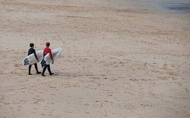 Fototapeta na wymiar surfer on the beach, water path