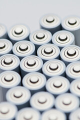 macro photo of batteries with the positive poles close up, background photo