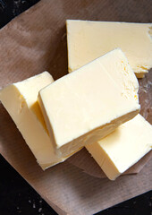 Fresh farm butter on parchment. Homemade butter