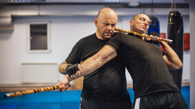 Two Men Sparring With Filipino Stick Fighting Martial Arts Stock Photo,  Picture and Royalty Free Image. Image 38725338.