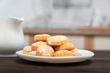 Homemade cookies on wooden kitchen table. Baking for tea. Dessert