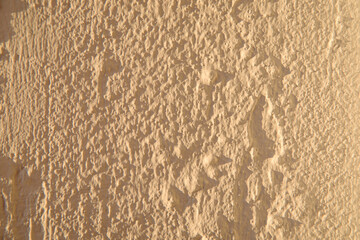 The concrete wall is beige. Texture. Background