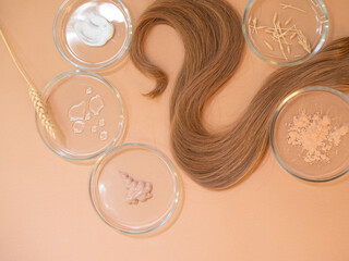 Eco-friendly cosmetics for hair care, a set of ingredients and bottles