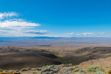 landscape from the lookout Tec. Julio Heredia El Monito,located on the road to calafate, argentina santa cruz with beautiful colors and cloud shadows in the hills of the plain