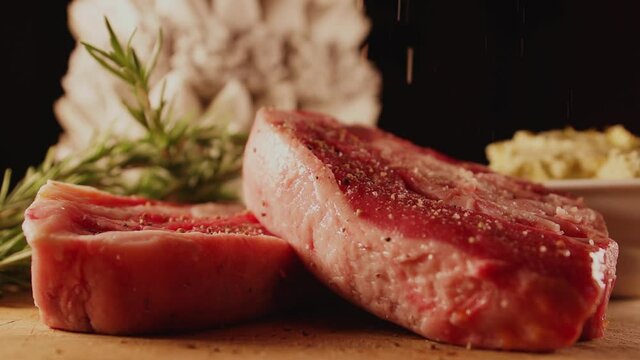Slow Motion Seasoning the meat, Steak raw, Barbecue Rib Eye,Steak