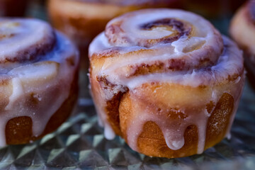 mini cinnamon rolls baked goods served on glass crystal faceted tray