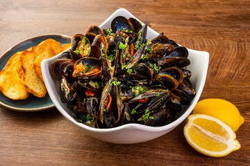 ready-made mussels in a large plate 