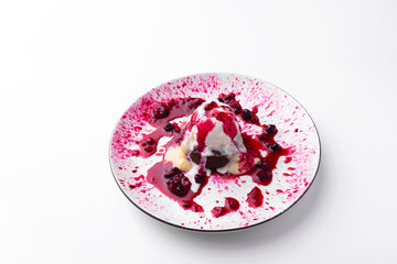 Photo of delicious tasty ice cream with berries and brownie