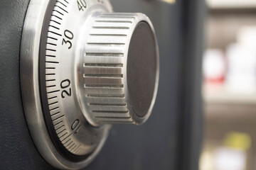combination lock on the safe. close up, gray safe