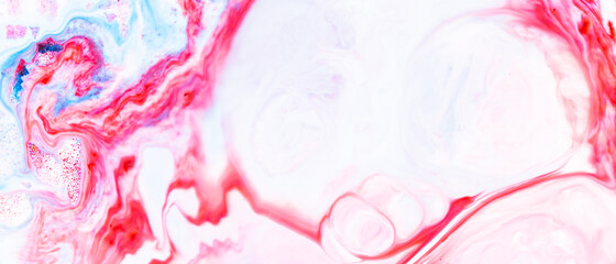 Fluid art. Abstract colorful background, wallpaper. Liquid marbling background. Mixed blue and light pink paints. Trendy colorful backdrop