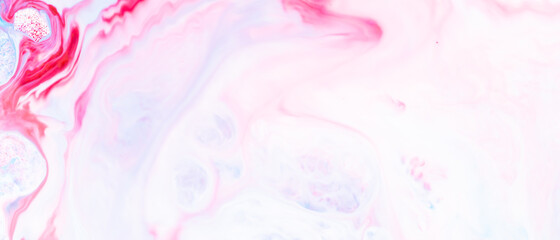 Fluid art. Abstract colorful background, wallpaper. Liquid marbling background. Mixed blue and light pink paints. Trendy colorful backdrop