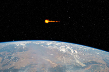 Asteroid passing planet Earth, elements of this image furnished by NASA