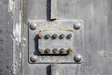 Fototapeta na wymiar Old vintage intercom doorbell on apartment building doors