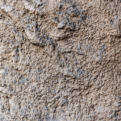 texture of old wall with cracks and peeled paint