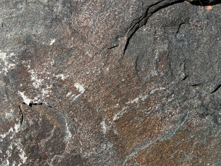 Various stone slabs of granite, basalt or sandstone, gray to colored, as background