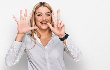 Young caucasian woman wearing casual clothes showing and pointing up with fingers number eight while smiling confident and happy.