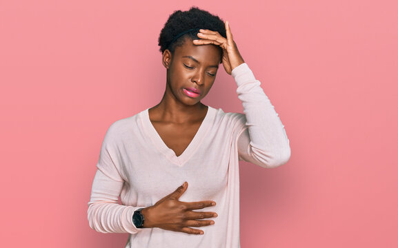 Young african american girl wearing casual clothes touching forehead for illness and fever, flu and cold, virus sick