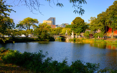Fototapeta na wymiar Tranquil Autumn Landscape over the Storrow Lagoon of Charles River in the Back Bay Boston