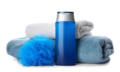 Personal hygiene product with towels and shower puff on white background