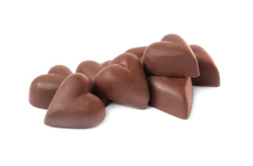 Delicious heart shaped chocolate candies on white background