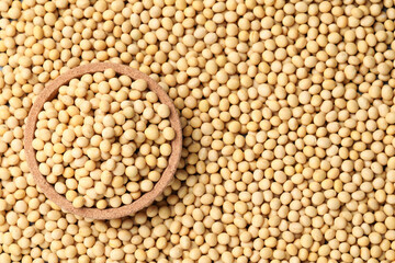 Soy with wooden bowl, top view. Space for text