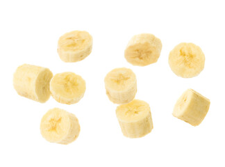 Slices of tasty ripe banana falling on white background