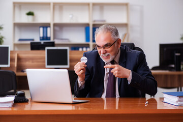 Businessman in the office playing games