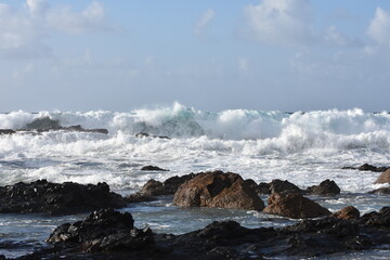 The sea demonstrating its power against the cliffs